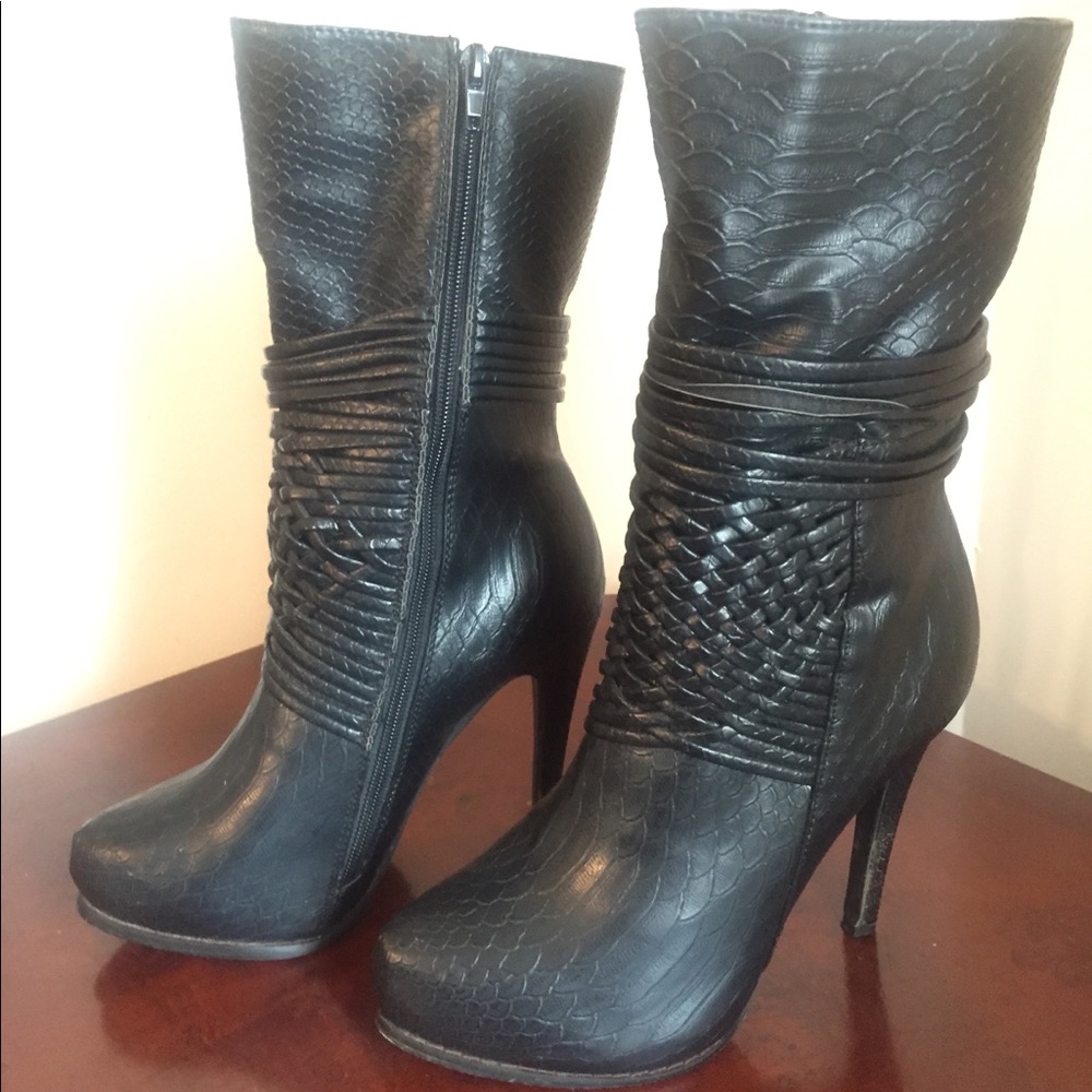 Black ankle height high heeled boots